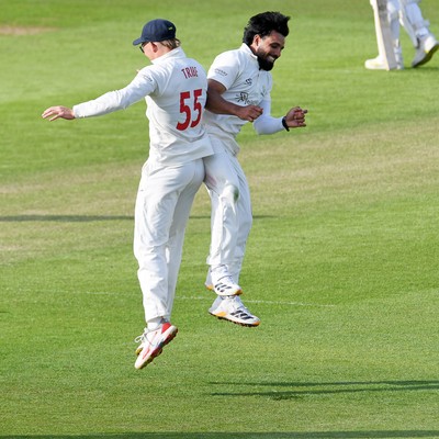 080526 - Glamorgan v Somerset - Rothesay County Championship -  Asa Tribe of Glamorgan celebrates with Zain Ul Hassan after catching the ball to dismiss Lewis Gregory of Somerset