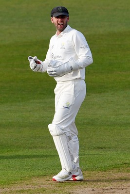 080526 - Glamorgan v Somerset - Rothesay County Championship -  Chris Cooke of Glamorgan celebrates with Asa Tribe after he catches the last ball of the day to dismiss Migael Pretorius of Somerset