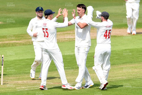 080526 - Glamorgan v Somerset - Rothesay County Championship -  Ryan Hadley of Glamorgan bowls the ball to dismiss Josh Thomas of Somerset