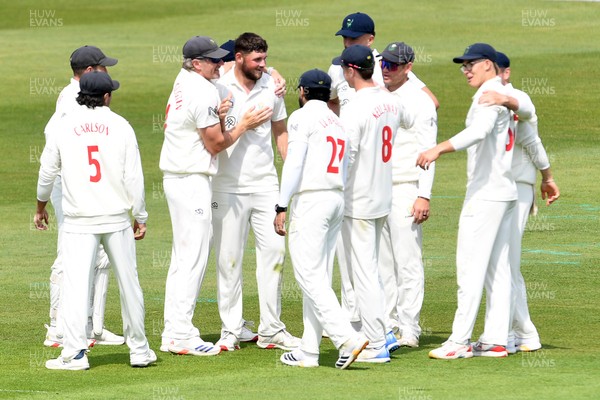 080526 - Glamorgan v Somerset - Rothesay County Championship -  Tom Norton of Glamorgan celebrates with team mates after bowling the ball to dismiss Tom Lammonby of Somerset (LBW)