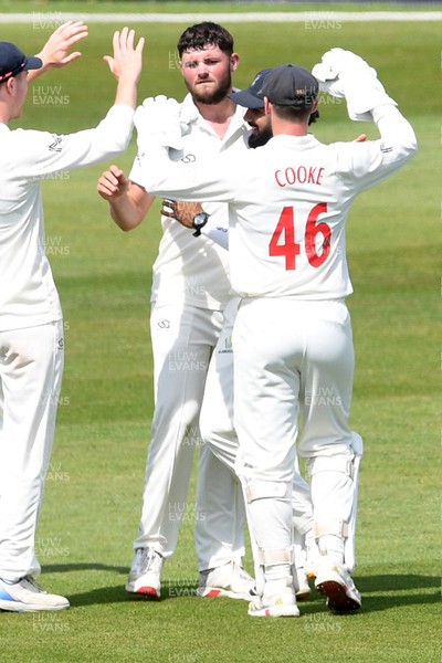 080526 - Glamorgan v Somerset - Rothesay County Championship -  Tom Norton of Glamorgan celebrates with team mates after taking the wicket of Archie Vaughan of Somerset