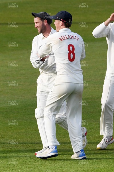 080526 - Glamorgan v Somerset - Rothesay County Championship -  Chris Cooke of Glamorgan celebrates with Ben Kellaway after he catches the last ball of the day to dismiss Migael Pretorius of Somerset