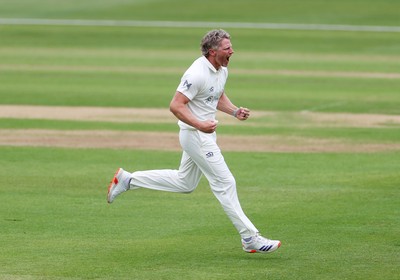100526 - Glamorgan v Somerset - Rothesay County Championship, Division One - Timm Van Der Gugten of Glamorgan celebrates taking the wicket of Craig Overton who was caught by Asa Tribe