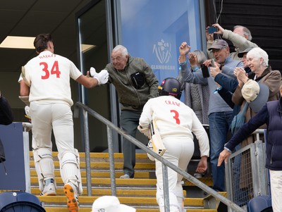110526 - Glamorgan v Somerset, Rothesay County Championship Division 1, Day 4 of 4 - Ryan Hadley of Glamorgan is congratulated by fans as he leaves the field having hit 50 run and the final runs that won Glamorgan the match