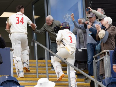 110526 - Glamorgan v Somerset, Rothesay County Championship Division 1, Day 4 of 4 - Ryan Hadley of Glamorgan is congratulated by fans as he leaves the field having hit 50 run and the final runs that won Glamorgan the match
