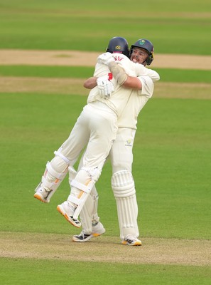 110526 - Glamorgan v Somerset, Rothesay County Championship Division 1, Day 4 of 4 - Mason Crane of Glamorgan and Ryan Hadley of Glamorgan celebrate as they secure the runs to beat Somerset