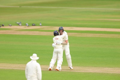 110526 - Glamorgan v Somerset, Rothesay County Championship Division 1, Day 4 of 4 - Mason Crane of Glamorgan and Ryan Hadley of Glamorgan celebrate as they secure the runs to beat Somerset