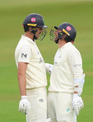 110526 - Glamorgan v Somerset, Rothesay County Championship Division 1, Day 4 of 4 - Ryan Hadley of Glamorgan, left, with Timm van der Gugten of Glamorgan after he hits a six