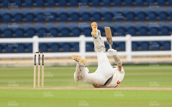 110526 - Glamorgan v Somerset, Rothesay County Championship Division 1, Day 4 of 4 - Ryan Hadley of Glamorgan takes a strike to the helmet