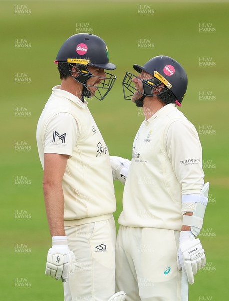 110526 - Glamorgan v Somerset, Rothesay County Championship Division 1, Day 4 of 4 - Ryan Hadley of Glamorgan, left, with Timm van der Gugten of Glamorgan after he hits a six