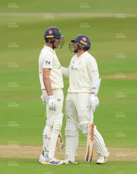 110526 - Glamorgan v Somerset, Rothesay County Championship Division 1, Day 4 of 4 - Ryan Hadley of Glamorgan, left, with Timm van der Gugten of Glamorgan after he hits a six