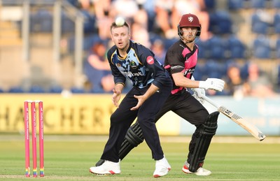 200625 - Glamorgan v Somerset, Vitality Blast  T20 - Mason Crane of Glamorgan and Tom Abell of Somerset keep their eyes on the ball