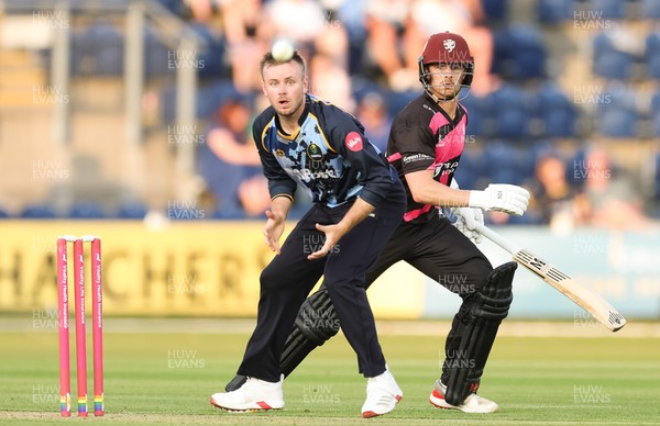 200625 - Glamorgan v Somerset, Vitality Blast  T20 - Mason Crane of Glamorgan and Tom Abell of Somerset keep their eyes on the ball