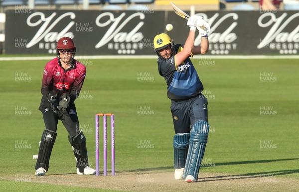 210419 - Glamorgan v Somerset, Royal London One Day Cup - Lukas Carey of Glamorgan hits the ball only to be caught by Azhar Ali of Somerset giving Somerset victory