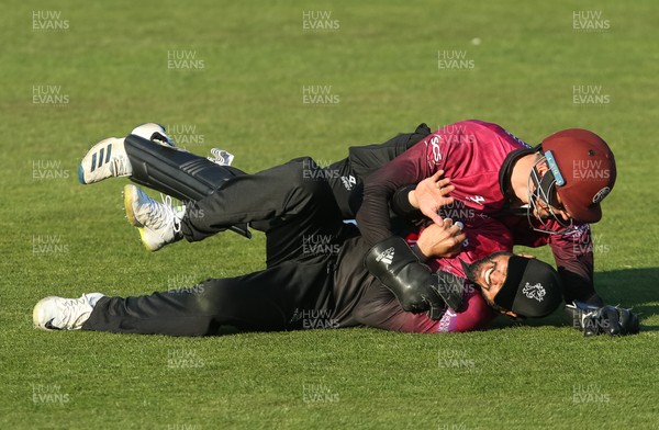 210419 - Glamorgan v Somerset, Royal London One Day Cup - Azhar Ali of Somerset celebrates with Tom Banton of Somerset after Lukas Carey of Glamorgan hits the ball only to be caught by Azhar Ali giving Somerset victory