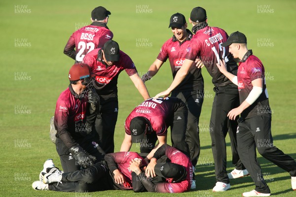 210419 - Glamorgan v Somerset, Royal London One Day Cup - Somerset players celebrate after Lukas Carey of Glamorgan hits the ball only to be caught by Azhar Ali of Somerset giving Somerset victory