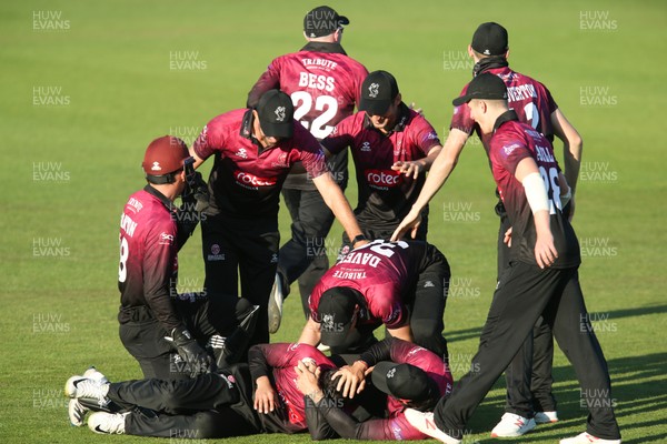 210419 - Glamorgan v Somerset, Royal London One Day Cup - Somerset players celebrate after Lukas Carey of Glamorgan hits the ball only to be caught by Azhar Ali of Somerset giving Somerset victory