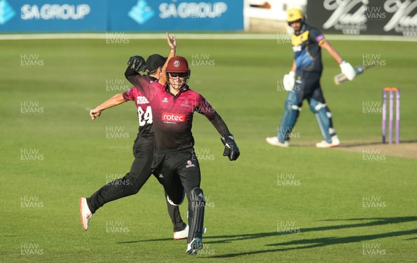 210419 - Glamorgan v Somerset, Royal London One Day Cup - Tom Banton of Somerset and Lewis Gregory of Somerset celebrates after Azhar Ali catches Lukas Carey of Glamorgan giving Somerset victory