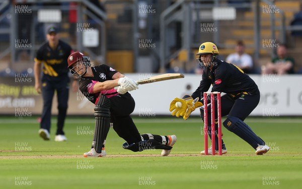 210623 - Glamorgan v Somerset, Vitality Blast - Tom Abell of Somerset looks to play a shot at Chris Cooke of Glamorgan collects the ball