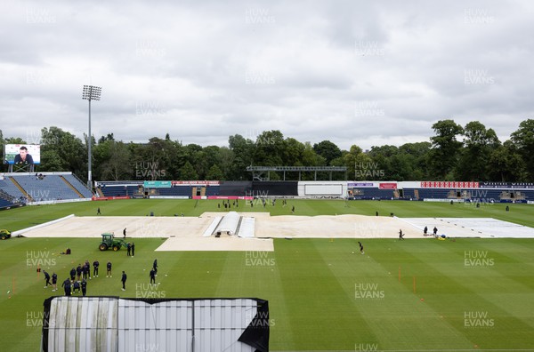 240622 - Glamorgan v Somerset, Vitality Blast T20 - Players warm up in anticipation of play despite the covers remaining on