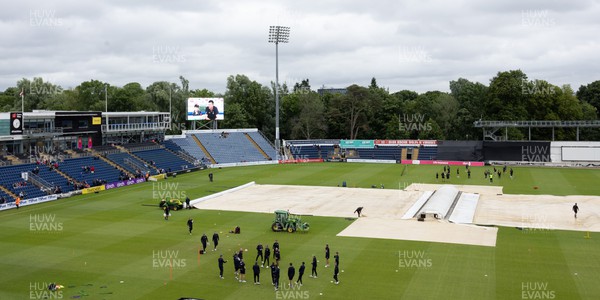 240622 - Glamorgan v Somerset, Vitality Blast T20 - Players warm up in anticipation of play despite the covers remaining on