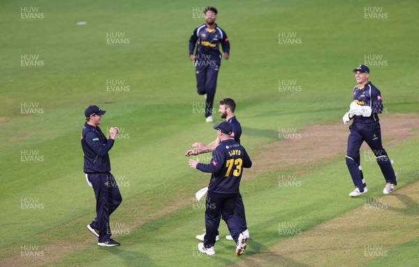 240622 - Glamorgan v Somerset, Vitality Blast T20 - Michael Neser of Glamorgan is congratulated by team mates after taking two wickets for three runs