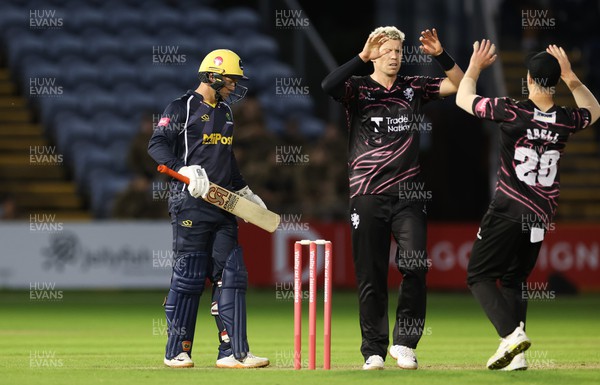 240622 - Glamorgan v Somerset, Vitality Blast T20 - Peter Siddle of Somerset and Tom Abell of Somerset celebrate the win as Colin Ingram of Glamorgan looks on