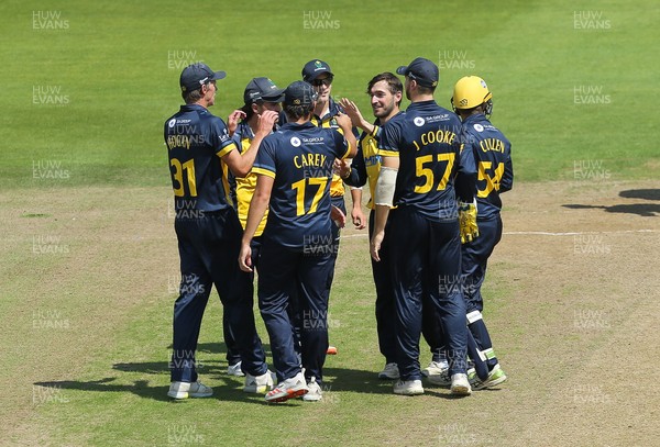 030821 - Glamorgan v Surrey, Royal London One Day Cup -Andrew Salter of Glamorgan is congratulated after taking the wicket of Nick Kimber of Surrey