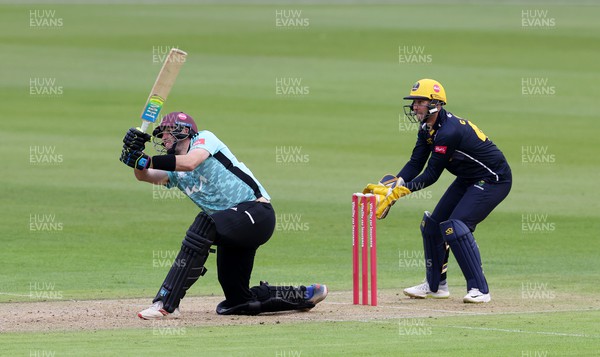 050622 - Glamorgan v Surrey - Vitality T20 Blast - Jamie Overton of Surrey hits the ball for six runs