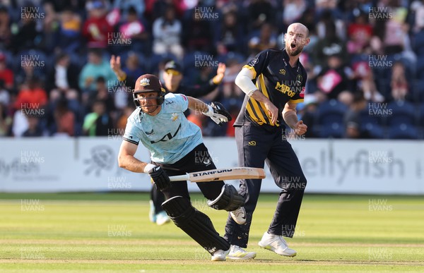 070623 - Glamorgan v Surrey, Vitality Blast T20 - Jamie McIlroy of Glamorgan reacts as Laurie Evans of Surrey looks to make a run