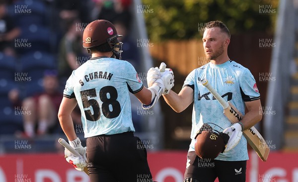 070623 - Glamorgan v Surrey, Vitality Blast T20 - Laurie Evans of Surrey acknowledges his 100 with Sam Curran of Surrey