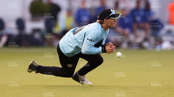070623 - Glamorgan v Surrey, Vitality Blast T20 - Tom Curran of Surrey drops the ball as he looks to catch Billy Root of Glamorgan