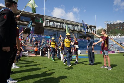 110819 - Glamorgan v Surrey, Vitality Blast - Fakhar Zaman and David Lloyd of Glamorgan head out to the wicket at the start of play