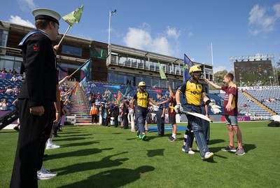 110819 - Glamorgan v Surrey, Vitality Blast - Fakhar Zaman and David Lloyd of Glamorgan head out to the wicket at the start of play