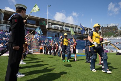 110819 - Glamorgan v Surrey, Vitality Blast - Fakhar Zaman and David Lloyd of Glamorgan head out to the wicket at the start of play