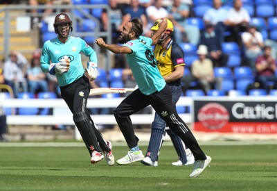 110819 - Glamorgan v Surrey, Vitality Blast - Imran Tahir of Surrey celebrates after he takes the wicket of Shaun Marsh of Glamorgan