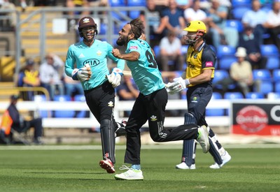 110819 - Glamorgan v Surrey, Vitality Blast - Imran Tahir of Surrey celebrates after he takes the wicket of Shaun Marsh of Glamorgan