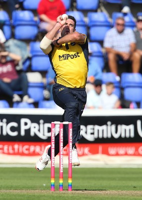 110819 - Glamorgan v Surrey, Vitality Blast - Ruaidhri Smith of Glamorgan bowls