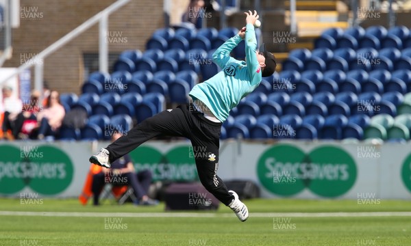 110819 - Glamorgan v Surrey, Vitality Blast - Ollie Pope of Surrey fails to hold a catch after diving to take Colin Ingram of Glamorgan
