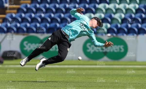 110819 - Glamorgan v Surrey, Vitality Blast - Ollie Pope of Surrey fails to hold a catch after diving to take Colin Ingram of Glamorgan
