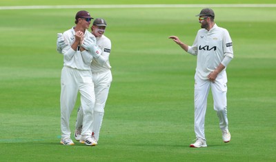 190626 - Glamorgan v Surrey, Rothesay County Championship Division 1- Adam Thomas of Surrey celebrates after he catches Sean Dickson of Glamorgan of the bowling of Jordan Clark of Surrey