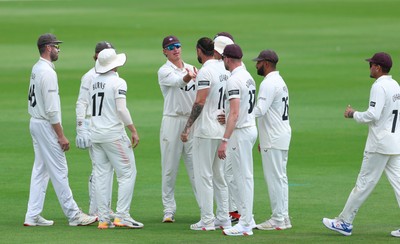 190626 - Glamorgan v Surrey, Rothesay County Championship Division 1- Adam Thomas of Surrey celebrates after he catches Sean Dickson of Glamorgan of the bowling of Jordan Clark of Surrey