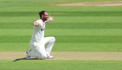 190626 - Glamorgan v Surrey, Rothesay County Championship Division 1- Jordan Clark of Surrey celebrates as he dismissed Timm van der Gugten of Glamorgan lbw