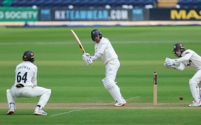 190626 - Glamorgan v Surrey, Rothesay County Championship Division 1- Mason Crane of Glamorgan plays a shot