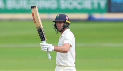 190626 - Glamorgan v Surrey, Rothesay County Championship Division 1- Chris Cooke of Glamorgan celebrates his 50