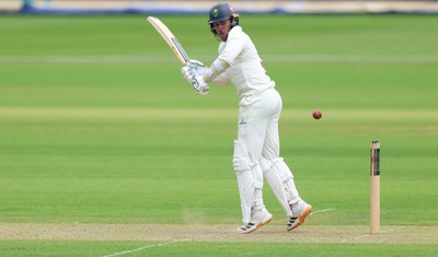 190626 - Glamorgan v Surrey, Rothesay County Championship Division 1- Mason Crane of Glamorgan plays a shot