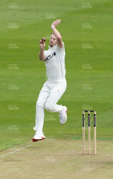 190626 - Glamorgan v Surrey, Rothesay County Championship Division 1- Gus Atkinson of Surrey bowls against Glamorgan at Sophia Gardens