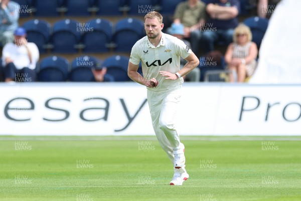 190626 - Glamorgan v Surrey, Rothesay County Championship Division 1- Gus Atkinson of Surrey bowls against Glamorgan at Sophia Gardens