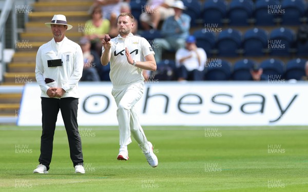 190626 - Glamorgan v Surrey, Rothesay County Championship Division 1- Gus Atkinson of Surrey bowls against Glamorgan at Sophia Gardens