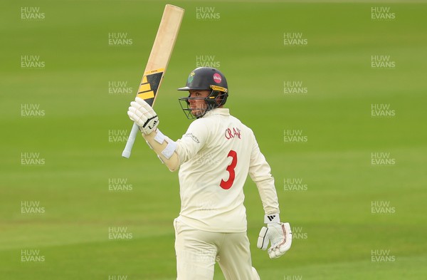 190626 - Glamorgan v Surrey, Rothesay County Championship Division 1- Mason Crane of Glamorgan celebrates his 50